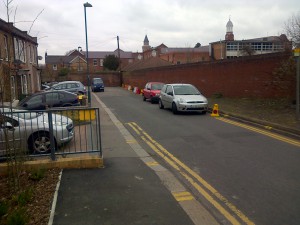 Shorts Road looking northwards toward the wall by St. Philomena's School 