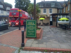 Fox and Hounds pub with a vintage Routemaster bus passing by!